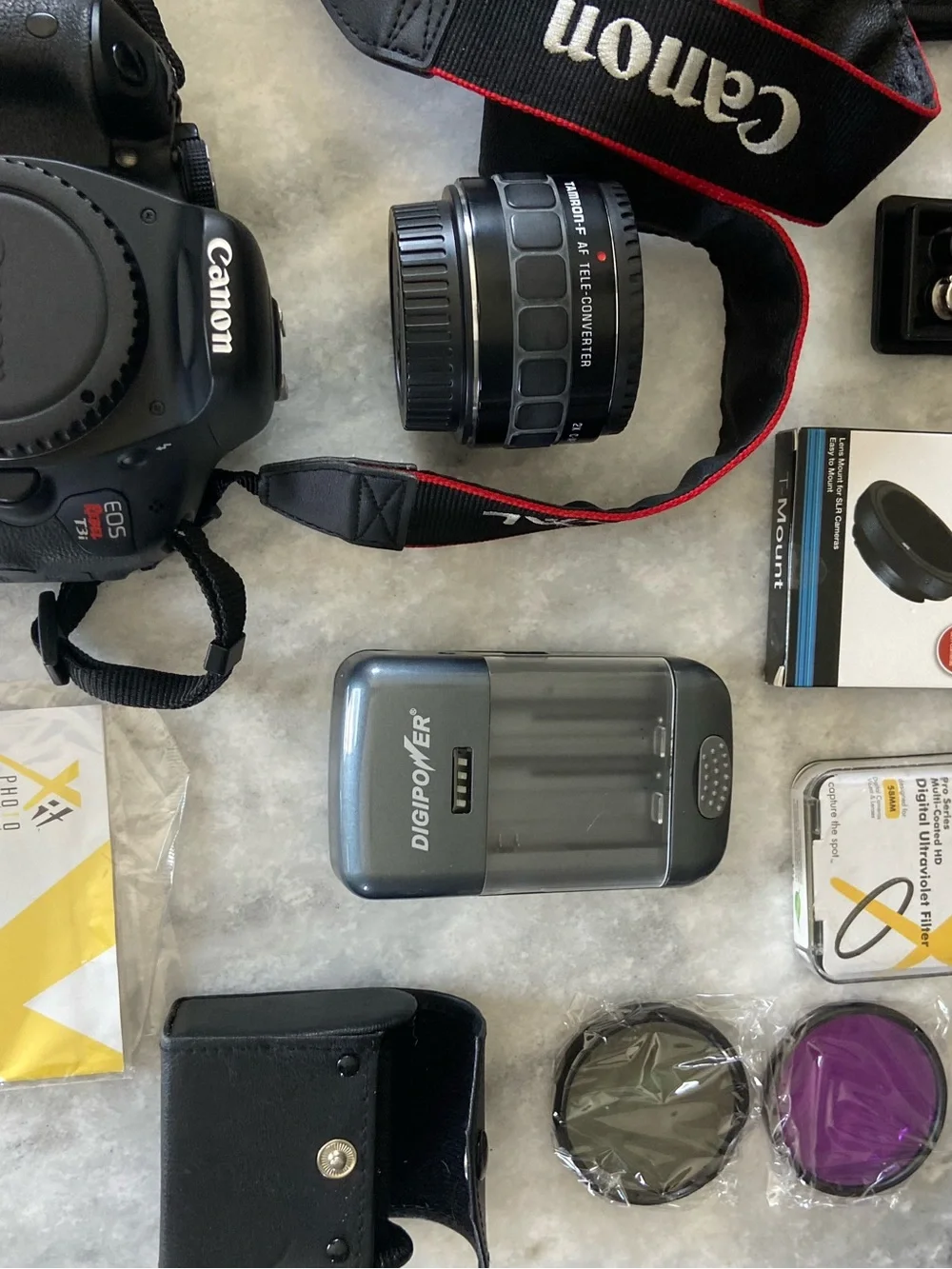 Canon DSLR Camera Body in Black with Red-Trim Strap